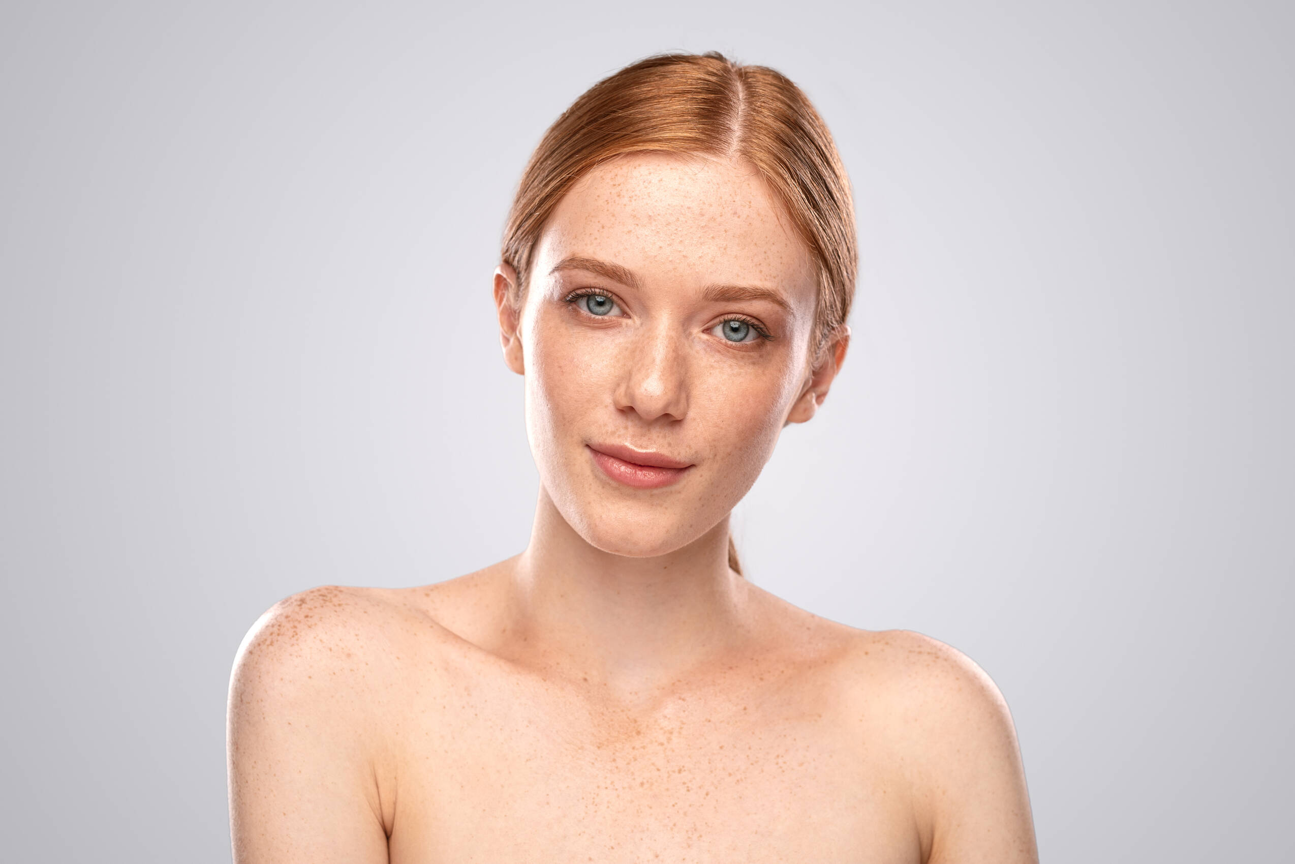 Pretty female against gray background