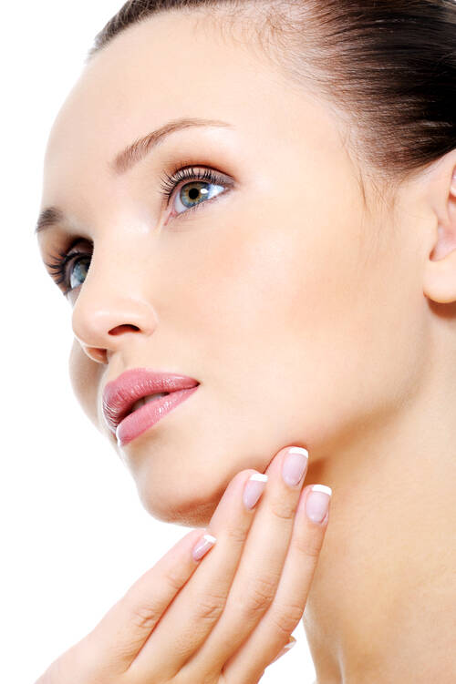 Attractive female face skincare treatment concept